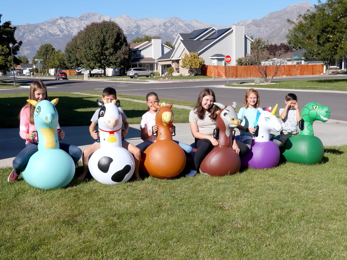 Hearthsong Hop N Go Inflatable Bull Riding Bouncy Hopping Toys for Kids Ages 5+ - Ride On Bouncer Animal Hopper Jumping Toys for Outdoor Games