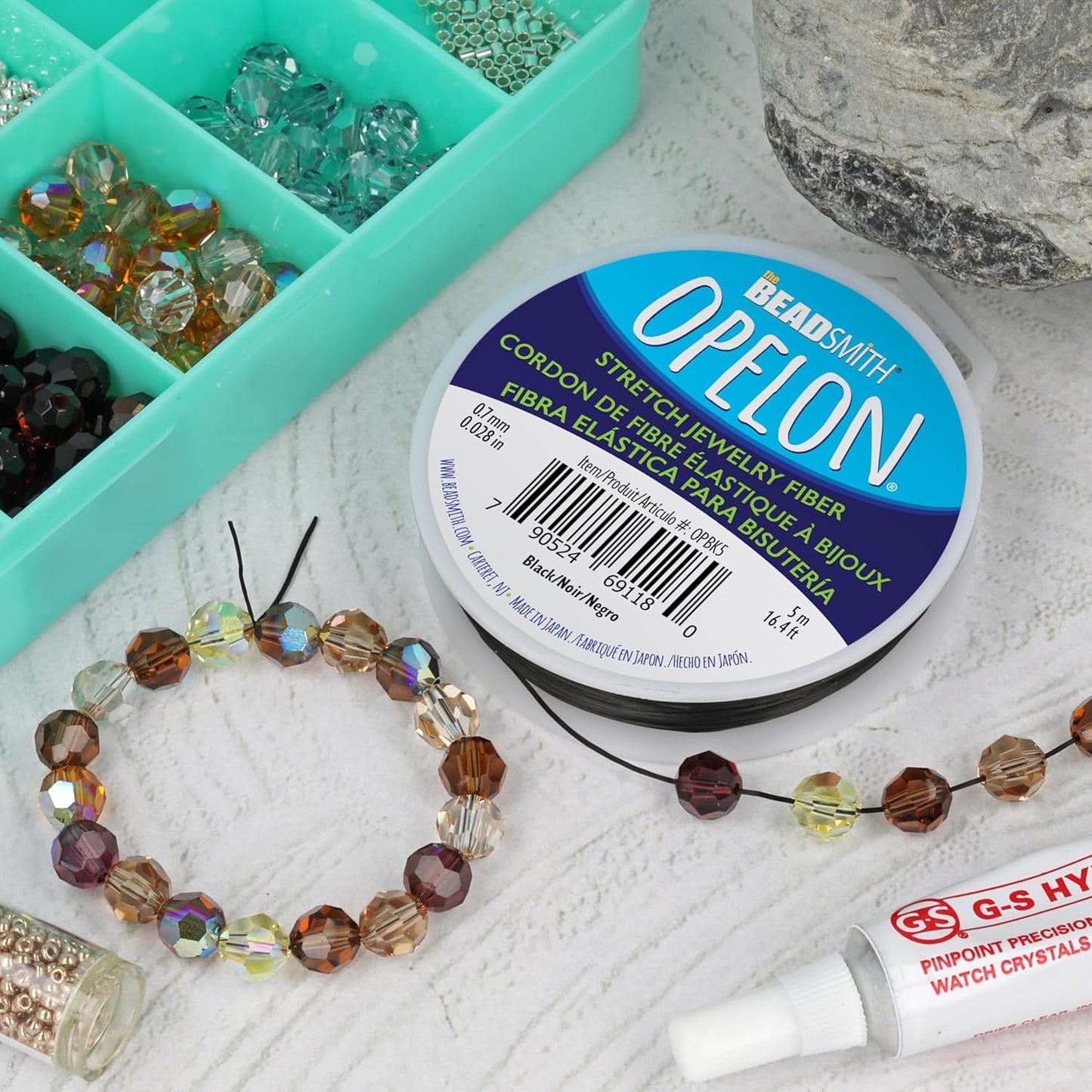 The Beadsmith Opelon Stretch Cord – Elastic Beading Fiber, Black, 0.7 mm Diameter, 5 Meters (16.4 ft) Spool