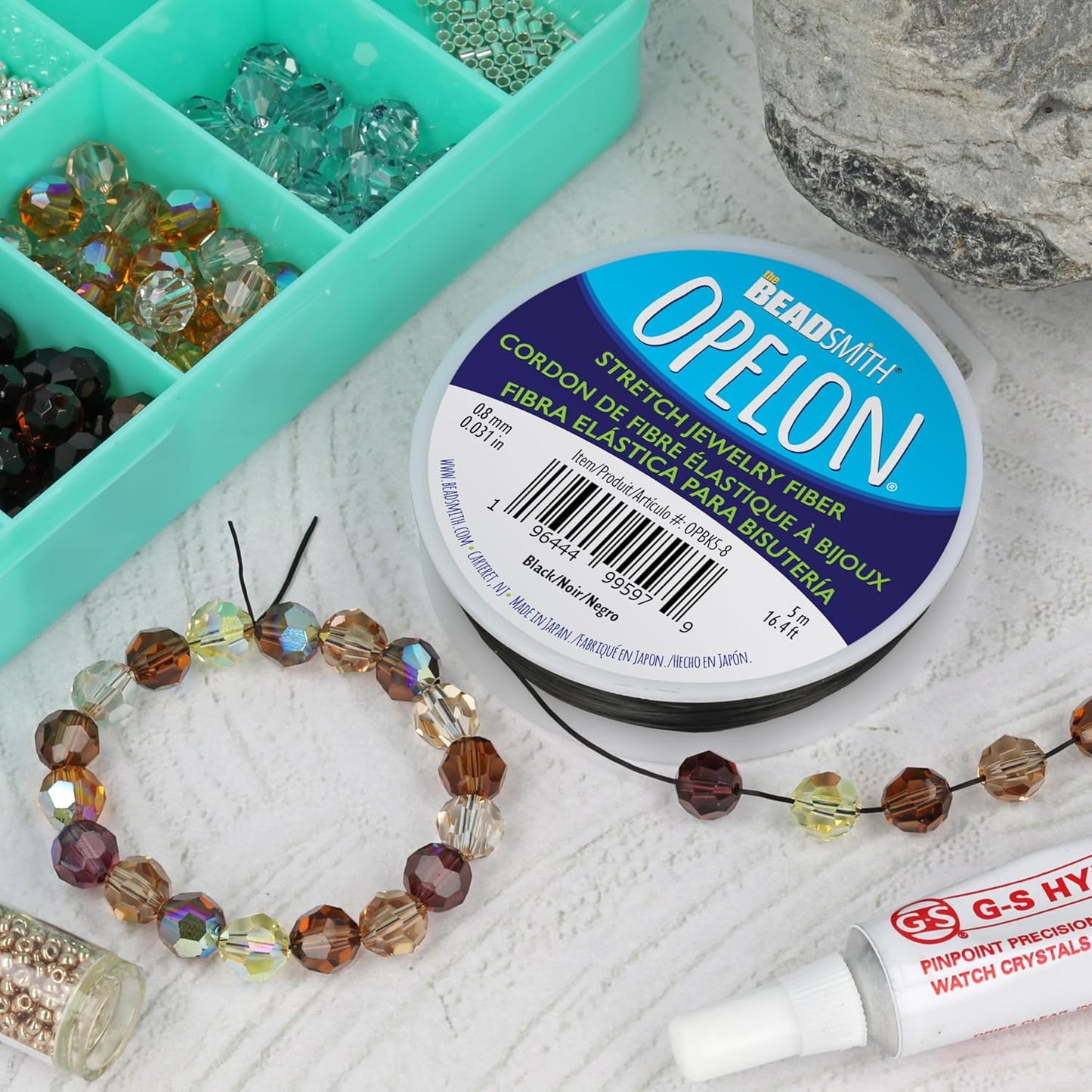 The Beadsmith Opelon Stretch Cord – Elastic Beading Fiber, Black, 0.8 mm Diameter, 5 Meters (16.4 ft) Spool