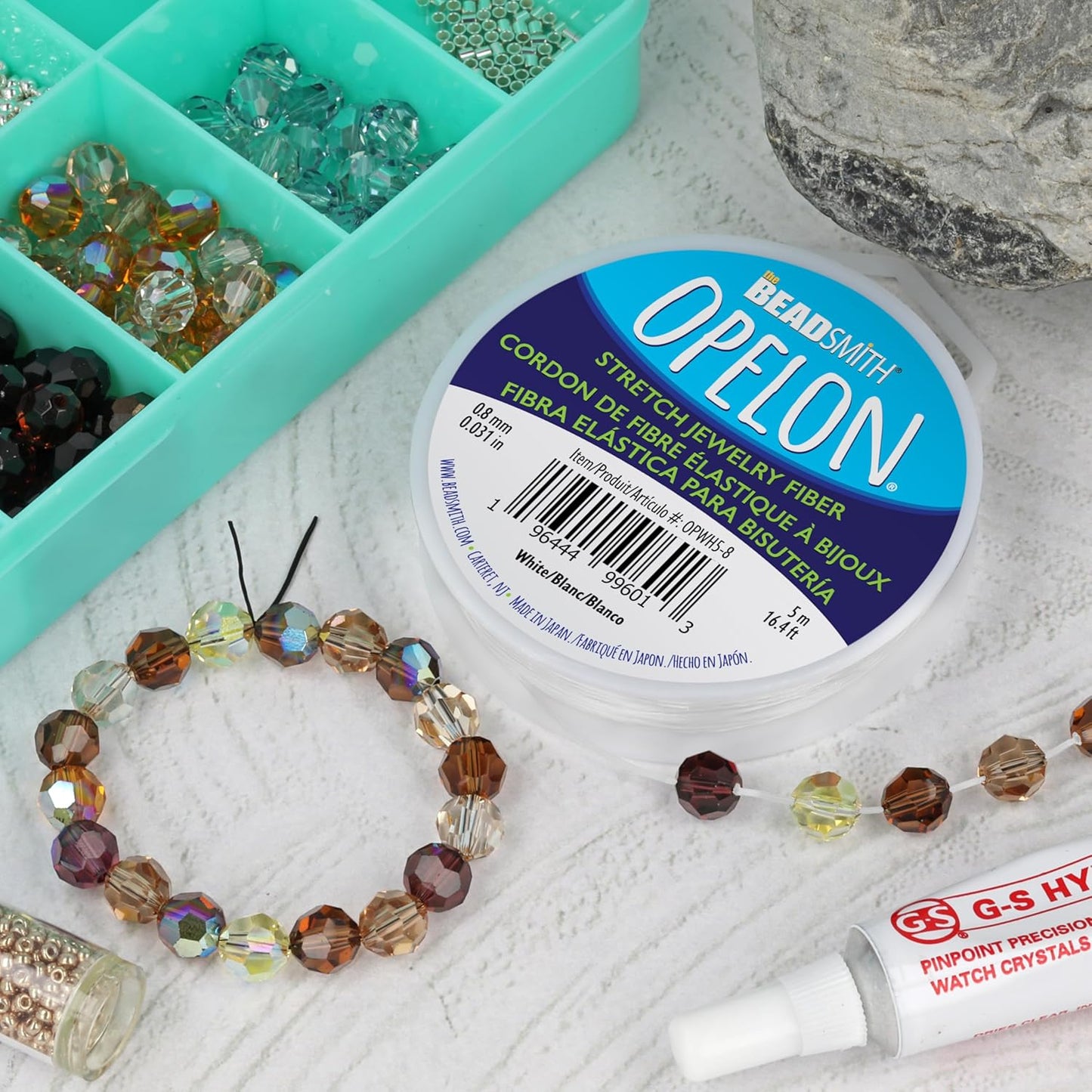 The Beadsmith Opelon Stretch Cord – Elastic Beading Fiber, White, 0.8 mm Diameter, 5 Meters (16.4 ft) Spool