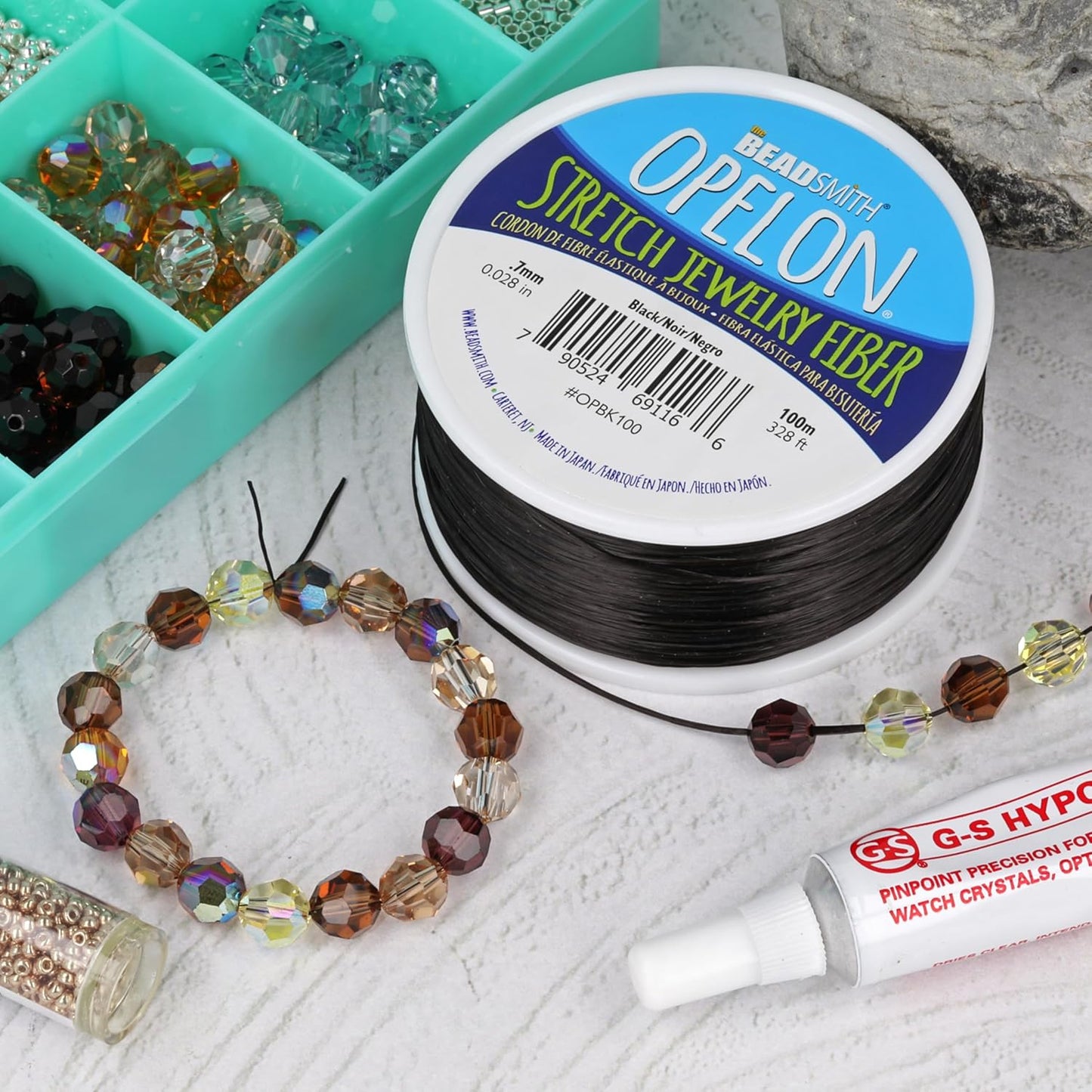 The Beadsmith Opelon Stretch Cord – Elastic Beading Fiber, Black, 0.7 mm Diameter, 100 Meters (328 ft) Spool