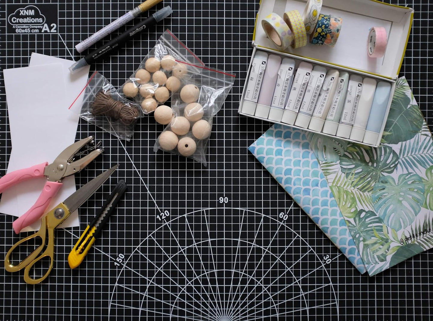 XNM Premium Self Healing Cutting Mat - 18 Inches by 24 inches - A2, 3 Layer Quality PVC Construction - Dual Sided, Imperial and Metric Grid Lines - Perfect for Cutting, Sewing, and Crafts